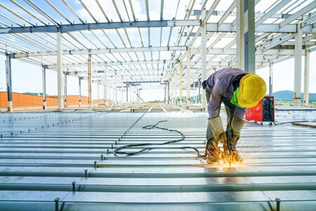 Shell contractor installing Epicore® Steel Decking